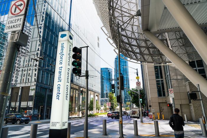 Salesforce transit center sign on a busy street in the financial sector