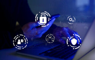 A programmer holds a smartphone and types on a laptop keyboard for setting up system configurations using one of the four types of salesforce sandboxes in the background.